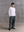 Model wears A.B.C kyneton relaxed fit long sleeve crewneck knit top made of 100% Good Earth Cotton.