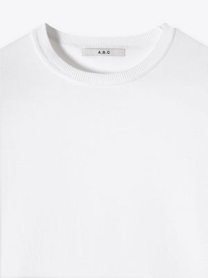 Close-up neck detail of A Brand Collective Kyneton Short Sleeve Knit Tee in White color.