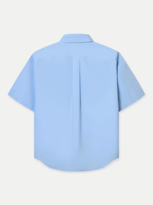 Designed for a relaxed fit, it features a classic point collar, a neat front button placket and double flap chest pockets. Wear it tucked in for a polished finish or left out for an effortlessly casual look.