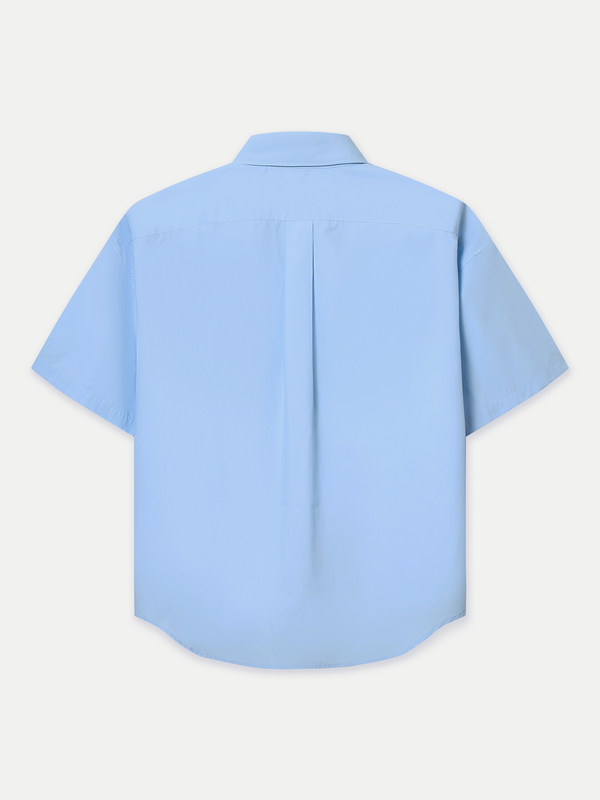 Designed for a relaxed fit, it features a classic point collar, a neat front button placket and double flap chest pockets. Wear it tucked in for a polished finish or left out for an effortlessly casual look.