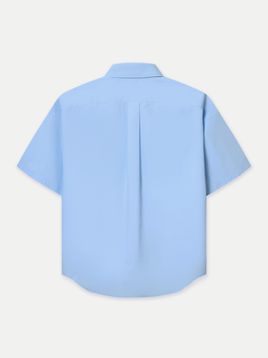 Designed for a relaxed fit, it features a classic point collar, a neat front button placket and double flap chest pockets. Wear it tucked in for a polished finish or left out for an effortlessly casual look.