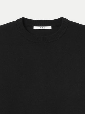 Close up of the Black Glenorchy Crew Neck Sweater ribbed collar A.B.C A BRAND COLLECTIVE