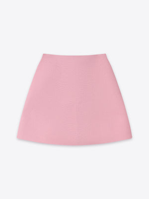 Soft pink Fawkner Milano Knit Mini Skirt by A.B.C A BRAND COLLECTIVE for a modern edge.