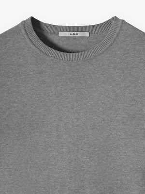 Close-up neck detail of Kyneton Relaxed Fit Short Sleeve Knit Tee by A Brand Collective.