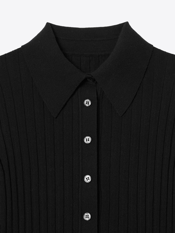 Close-up neck detail of Newport Button Up Long Sleeve Knit Shirt in black made of 100% Good Earth Cotton.