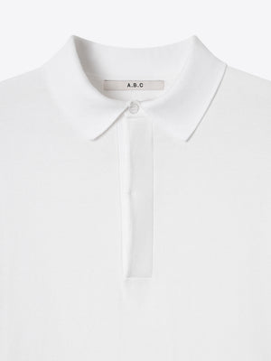 Detailed view of the white Kyneton Relaxed Fit Knit Polo collar A.B.C A BRAND COLLECTIVE 100% Good Earth Cotton