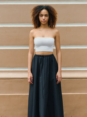 Fresh and bright white Preston Bandeau worn by model for a chic summer vibe in 100% Good Earth Cotton.