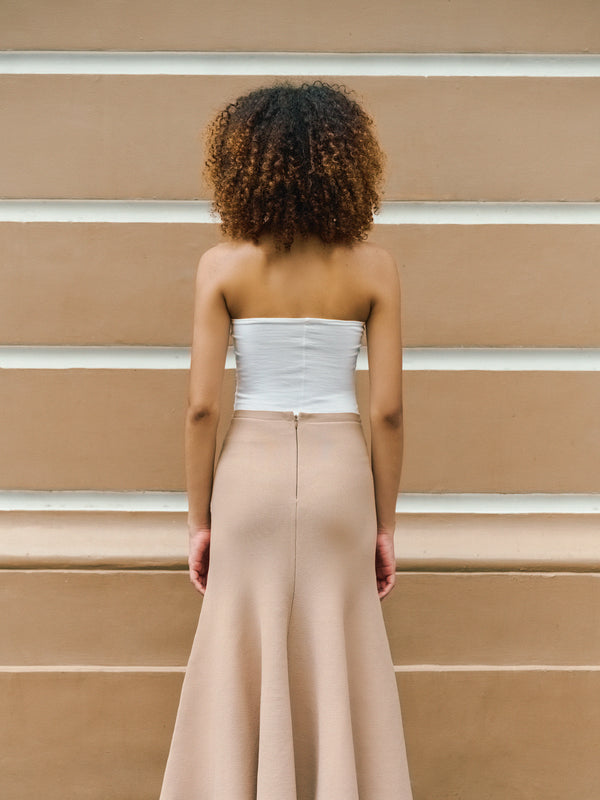 Back view of the white regular bandeau by A.B.C A BRAND COLLECTIVE, ideal for versatile layering.