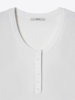A.B.C A BRAND COLLECTIVE Windsor Scooped Top close up of 6 delicate buttons on soft ivory waffle knit fabric Signature Cotton Blend