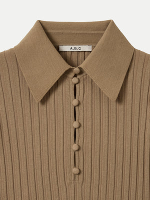 Detailed view of the wide rib texture and collar on the tan A.B.C A BRAND COLLECTIVE Newport top.