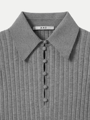 Close up of the button-up collar on the grey A.B.C A BRAND COLLECTIVE Newport knit top.