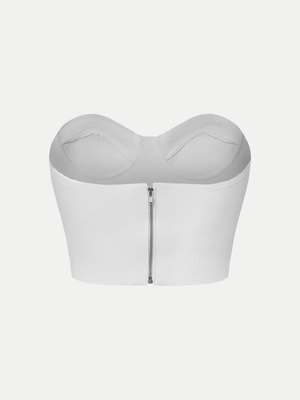 Rear view of the white A.B.C A BRAND COLLECTIVE bustier showcasing the clean, structured silhouette.