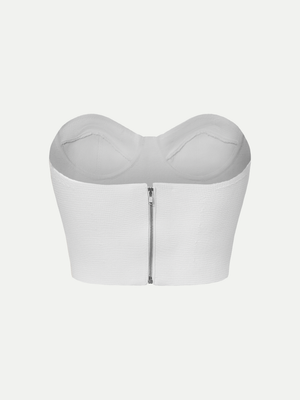 Rear view of the white A.B.C A BRAND COLLECTIVE bustier showcasing the clean, structured silhouette.