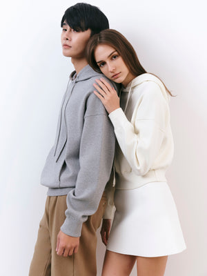 A.B.C A BRAND COLLECTIVE Kyneton Hoodie models leaning together to showcase the soft drape and cozy knit feel 100% Good Earth Cotton