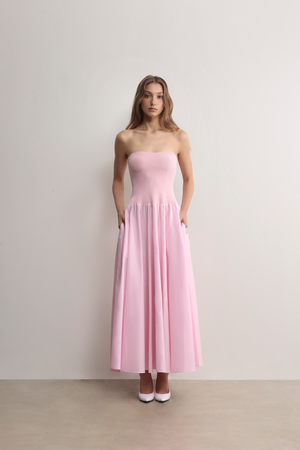 Dress up with items from A.B.C A BRAND COLLECTIVE like this timeless pink Ballina Strapless Dress.