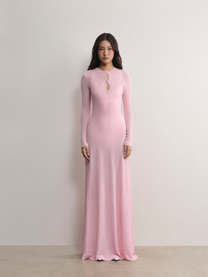 Tailored A.B.C A BRAND COLLECTIVE long sleeve dress featuring a subtle front cut out and sophisticated floor length drape