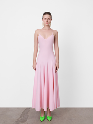 A.B.C - A Brand Collective pink slip dress featuring a fluid midi skirt and a soft touch cotton blend close fitting bodice