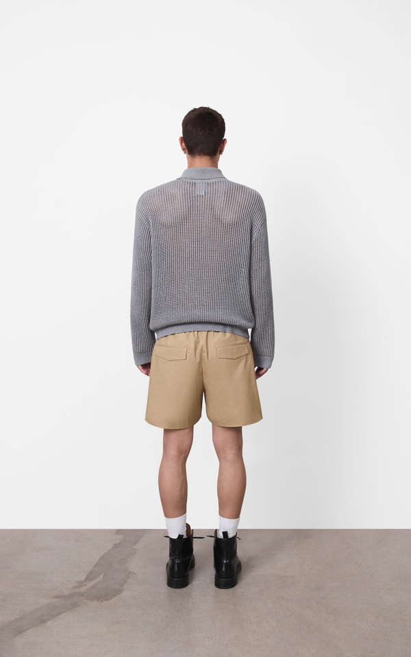 A.B.C A BRAND COLLECTIVE grey marle polo top featuring a relaxed open weave mesh knit construction and a classic collar