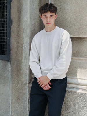 Model wearing the Ivory Glenorchy Knit Sweater A.B.C A BRAND COLLECTIVE lifestyle view
