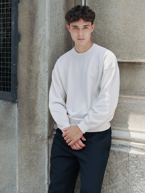 Model wearing the Ivory Glenorchy Knit Sweater A.B.C A BRAND COLLECTIVE lifestyle view