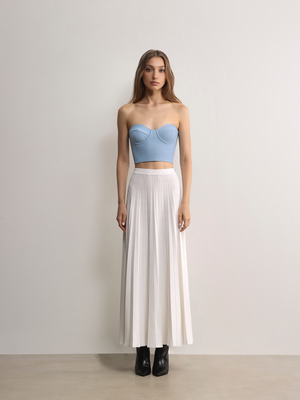 Model styling the white Prahran Pleat Knit Midi Skirt A.B.C A BRAND COLLECTIVE effortless drape and comfort