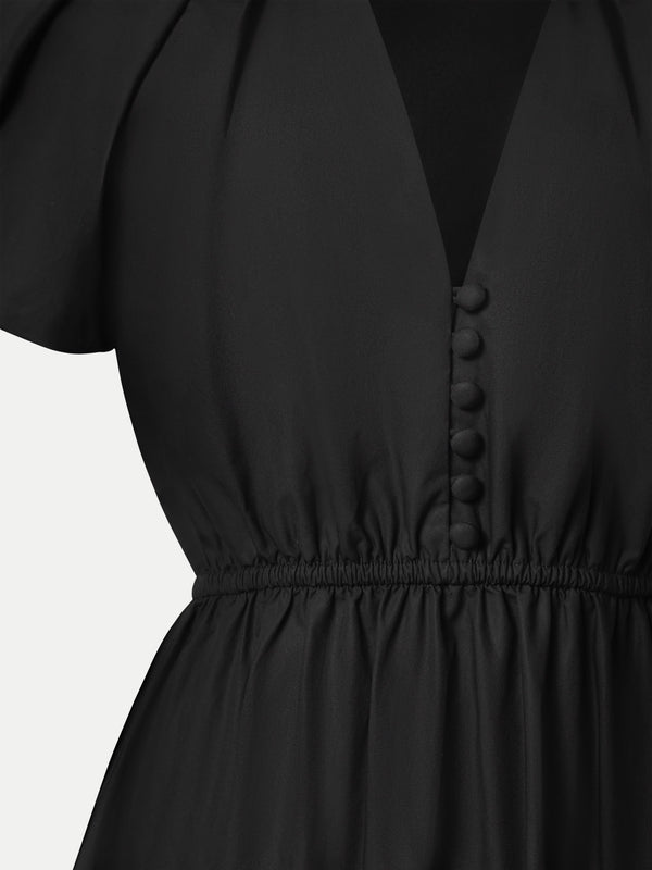 Sophisticated black A.B.C A BRAND COLLECTIVE dress detail: expert waist gathering meets durable, high-quality natural fibers.