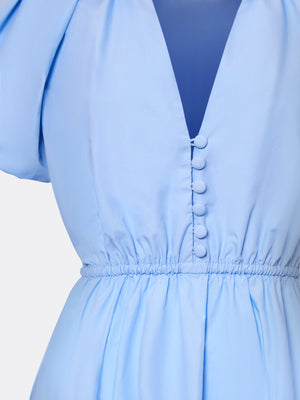 Close-up of A.B.C A BRAND COLLECTIVE blue dress showing delicate button details and the crisp texture of breathable poplin