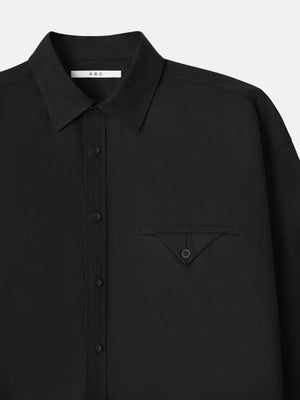 Refined minimalist black Moree Relaxed Shirt A.B.C A BRAND COLLECTIVE with a functional welt pocket.