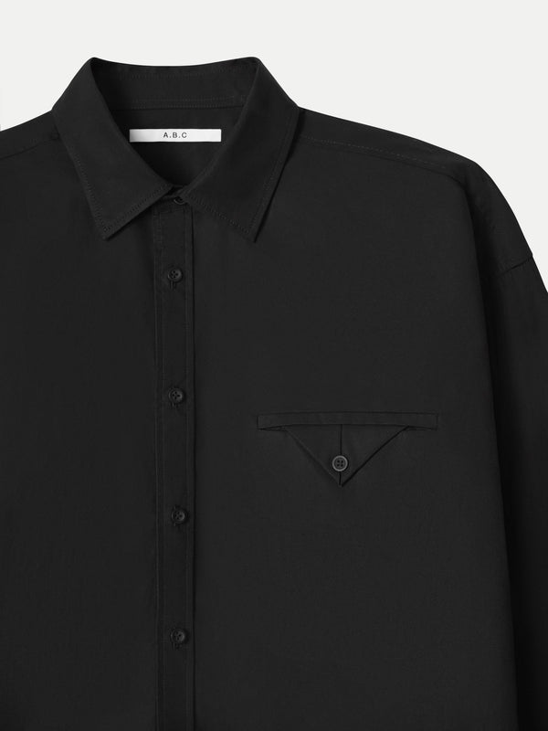 Refined minimalist black Moree Relaxed Shirt A.B.C A BRAND COLLECTIVE with a functional welt pocket.