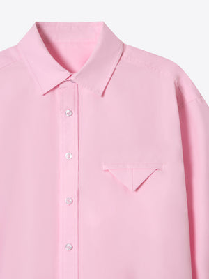 Close-up of the pink Moree Shirt A.B.C A BRAND COLLECTIVE showing the soft cotton poplin texture.