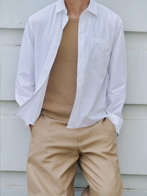 Layer your favorite items from A.B.C A BRAND COLLECTIVE with the white Moree Welt Pocket Shirt.