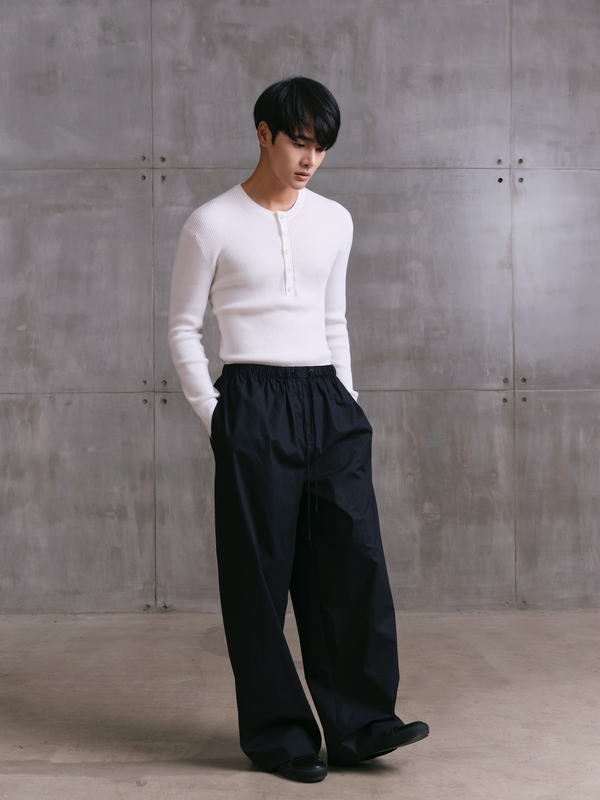 Modern styling of MOREE poplin pants paired with a long-sleeve knit for a complete A.B.C A BRAND COLLECTIVE aesthetic in 100% Good Earth Cotton.
