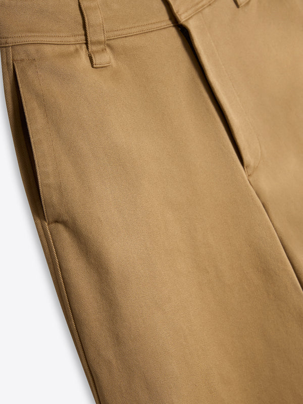 Close-up of the tan heavy cotton twill fabric, highlighting the resilient texture of 100% Good Earth Cotton.