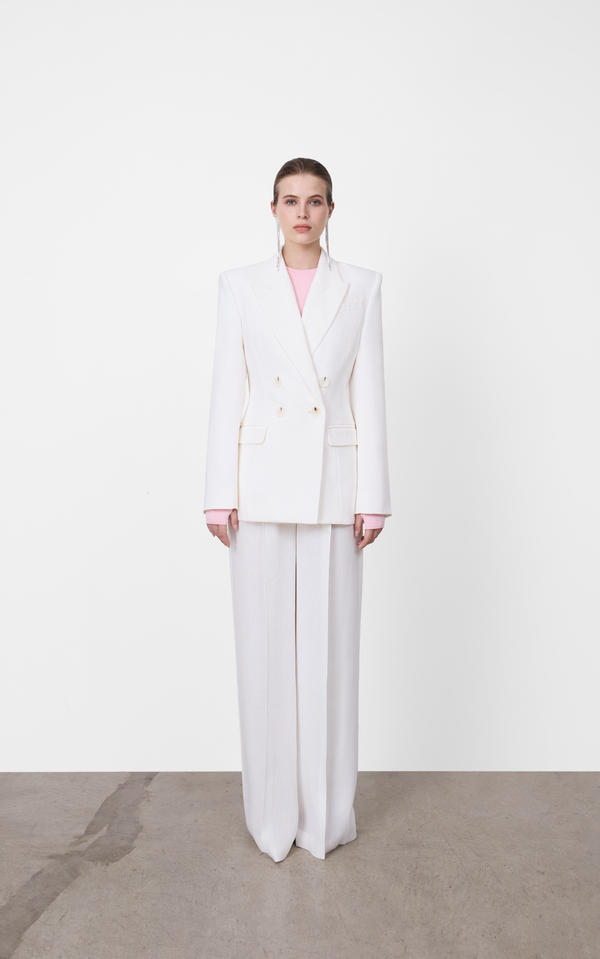 White A.B.C A BRAND COLLECTIVE wide leg trousers featuring a flattering high waisted fit and elegant double front pleats