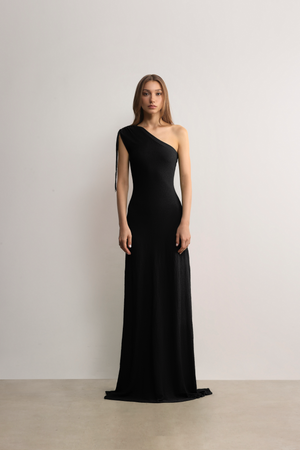 Female model wears knit dress from Knitwear collection.