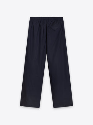 Rear view of MOREE pants showcasing unique flap pocket design and high-quality construction in 100% Good Earth Cotton.
